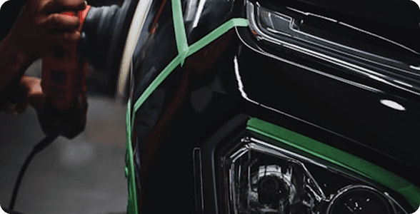 Car detailing work in progress with polishing tool